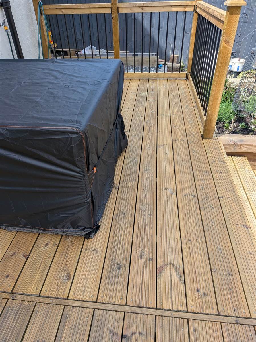 Decking after cleaning and treatment — looking fresh and safe